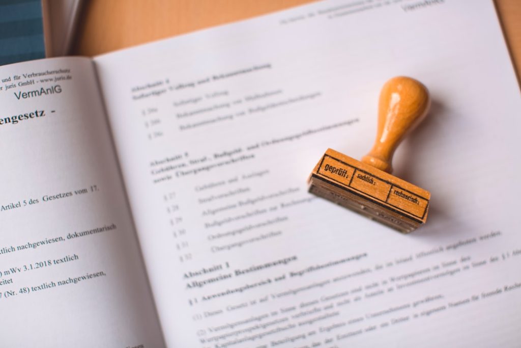 Legal office documents with checked stamp
