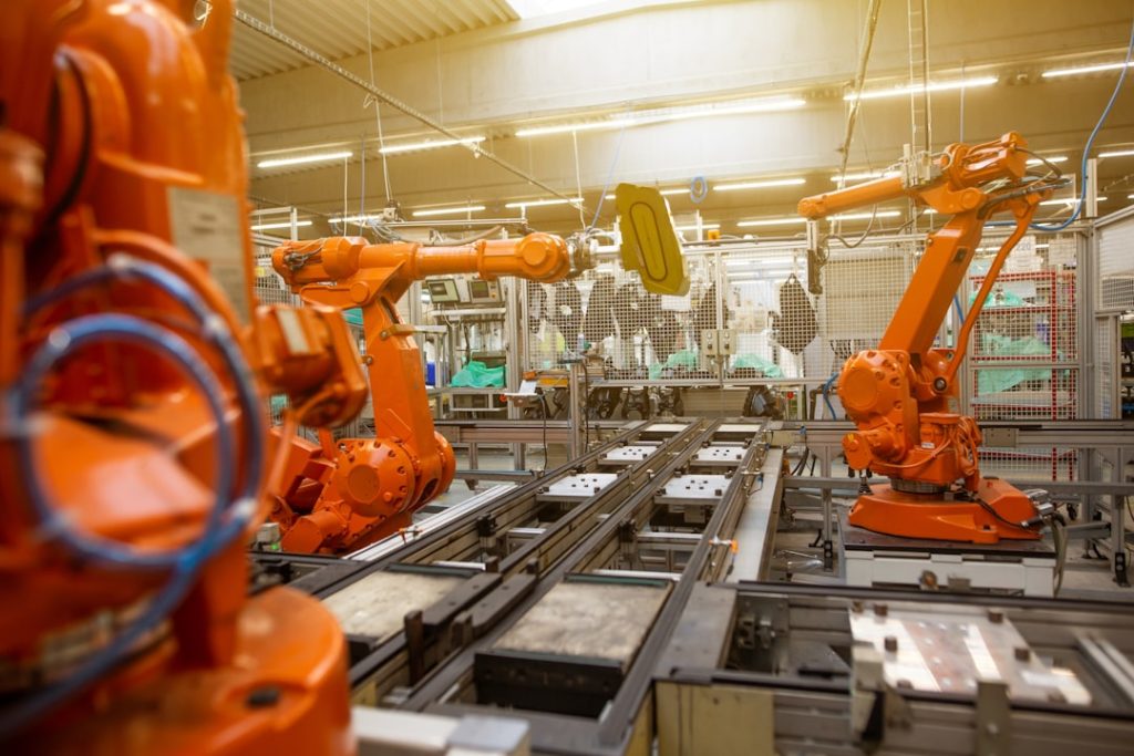 Automatic robots in an industrial factory